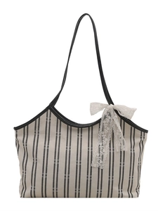 Large striped canvas tote bag for women with black leather trim and lace bow accent