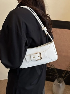 Elegant white faux leather baguette shoulder bag with gold buckle and knotted strap detail