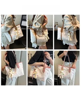 Detail view of stylish tote bags in pink and brown with cute animal prints and rabbit charms