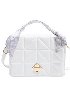 White quilted geometric crossbody bag with gold lock and silk scarf handle detail