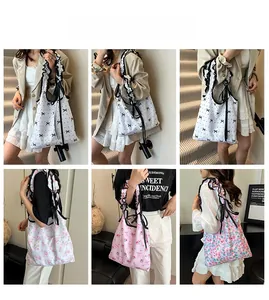 Floral canvas tote bags with ruffle lace straps and black bows in multiple colors