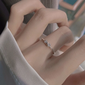 Elegant S925 sterling silver bow ring with micro-paved diamonds on finger