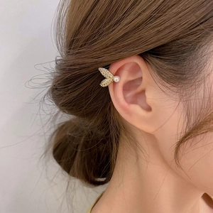 S925 silver fishtail ear cuff with pearls and zircons worn on a female ear