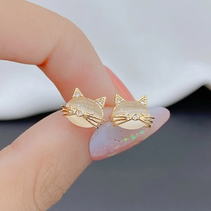 Cute kitten stud earrings with cat eye stone and cubic zirconia in golden finish