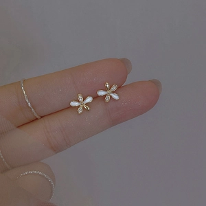 Elegant gold flower stud earrings with white petals and tiny zircon stone accents