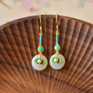 Elegant Chinese style drop earrings with white jade pendant and green enamel lotus details