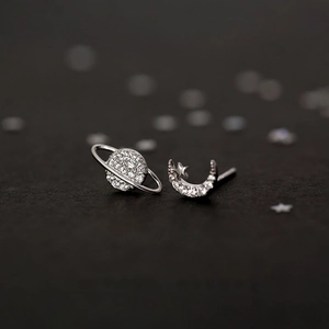 Asymmetric S925 silver stud earrings with planet and crescent moon motifs set with zircon