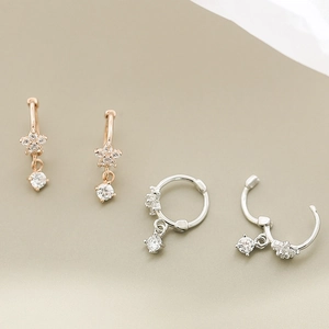 Exquisite S925 silver flower earrings with star charms in rose gold and silver finishes