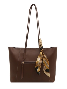 Classic dark brown leather tote bag with functional front zipper and chic printed scarf