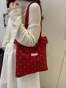 Red floral chiffon tote bag with ruffle details and AGOGO ORIGINAL label on shoulder