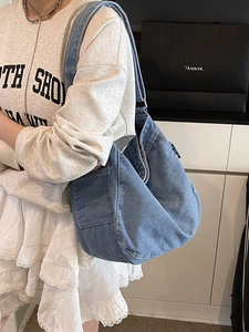 Retro denim hobo messenger bag with functional side pocket and raw edge finish