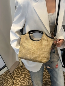 French style woven straw tote bag with black leather handles and detachable shoulder strap