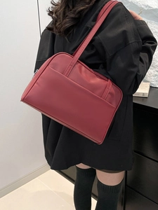 Dark red matte leather tote bag with front pocket and zipper for women's daily commute