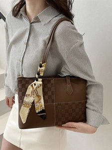Women's checkerboard tote bag in brown leather with decorative silk scarf accessory