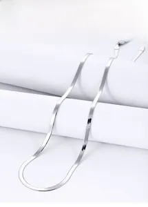 Detailed close-up of S925 sterling silver flat snake chain with polished lobster clasp