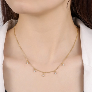 Elegant 925 silver necklace with five sparkling round zircons on a gold-plated chain