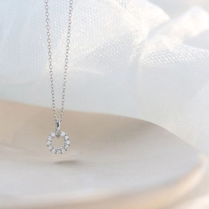 Minimalist S925 silver necklace with a geometric sparkling crystal circle pendant