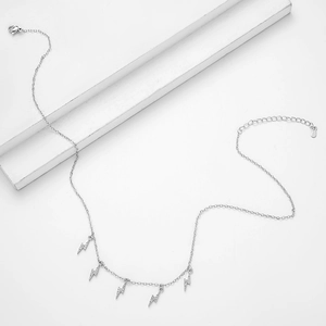 S925 sterling silver lightning tassel necklace with sparkling CZ stones on white background