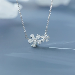 Minimalist silver cherry blossom necklace with sparkling zircon flowers for women