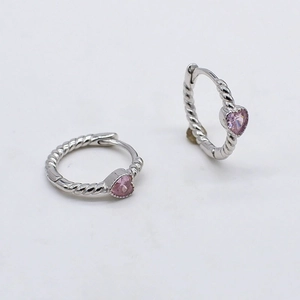 Silver twisted hoop earrings featuring pink heart-shaped zirconia stones for women