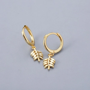 Close-up detail of S925 hallmark on minimalist gold olive leaf hoop earrings for women
