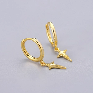 Macro shot of S925 sterling silver stamp on gold plated north star hoop earrings