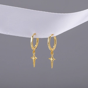 Elegant S925 sterling silver gold star dangle hoop earrings on a luxury silk ribbon