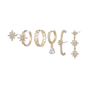 Chunky gold star and chain earrings set with white zircon stones for multiple piercings