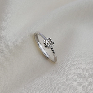 Elegant S925 sterling silver open ring featuring a delicate hollow rose flower design
