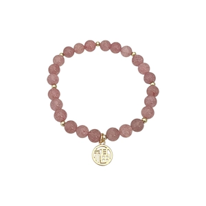 Armband mit rosa Erdbeerkristall Perlen, goldenen Trennelementen und Fu Glücksbringer
