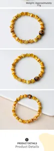 Détail d'un bracelet en œil de tigre facetté de 8mm avec entretoises dorées pesant 17g