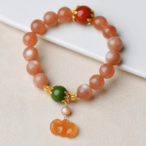 Natural 11mm sunstone beaded bracelet with orange pumpkin charm and red agate accents