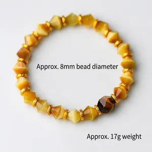 Bracelet en oeil de tigre naturel facetté 8mm avec entretoises dorées et perle 10mm