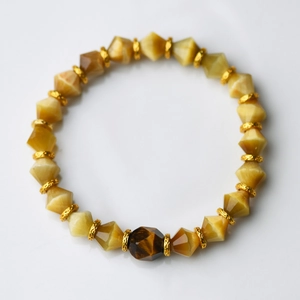 Bracelet en œil de tigre facetté 8mm avec entretoise de 10mm et perles métalliques