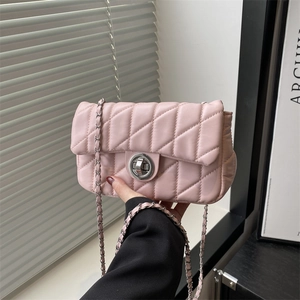 Pink quilted leather crossbody bag with silver metal turn-lock and chain strap