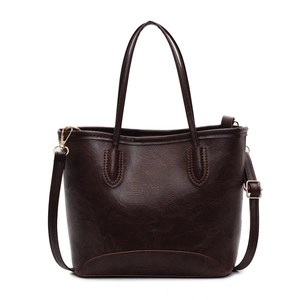 Vintage dark brown faux leather bucket bag with double handles and gold metal hardware