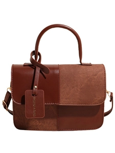 Retro two-tone brown contrast handbag with smooth leather and adjustable strap
