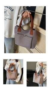 Détail du sac cabas en toile avec anses tressées et grande poche avant à rivets