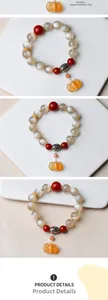 Detail showing 11mm moonstone beads, silver spacers and orange pendant weighing 39g