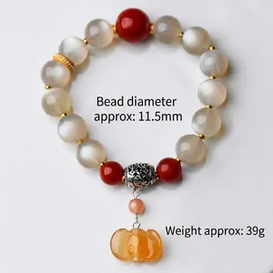11.5mm natural moonstone bracelet with orange carved pumpkin charm and silver bead
