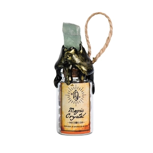 Magische kristallen fles met natuursteen op kurk met waszegel en decoratief label