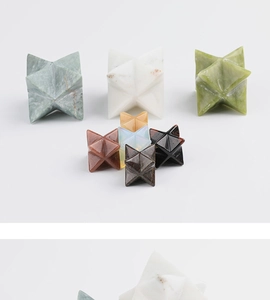 Macro shot of assorted natural crystal Merkaba stars with detailed stone textures