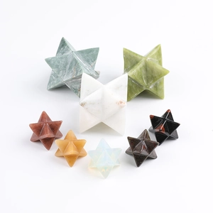 Polished natural crystal Merkaba stars in various sizes and stones on white background