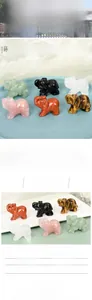 Detailed view of hand-carved natural crystal elephant figurines in various semi-precious stones