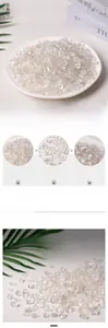 Close-up of natural translucent white quartz crystal chips for home decor and healing