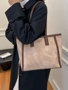 Große Damen-Tragetasche in Beige mit dunkelbraunem Besatz, perfekt für den Alltag und Büro