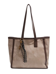 Minimalistische Canvas-Einkaufstasche in Beige mit braunem Lederbesatz und Anhänger