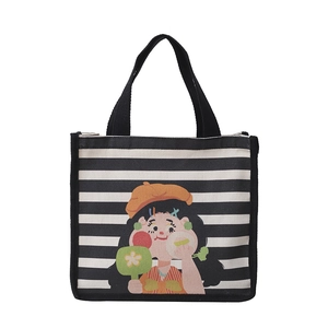 Cute striped canvas handbag with cartoon girl illustration and sturdy black handles