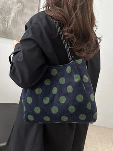 Vintage navy blue polka dot tote bag with green flocking and black chain strap for women