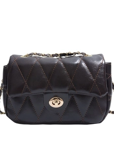 Deep brown quilted leather chain bag with golden metal twist lock and luxury finish